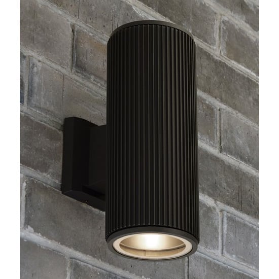 Product photograph of Azha Outdoor Up Down Wall Light In Black With Clear Glass from Furniture in Fashion