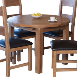 Hewitt Wooden Round Extending Dining Table In Oak