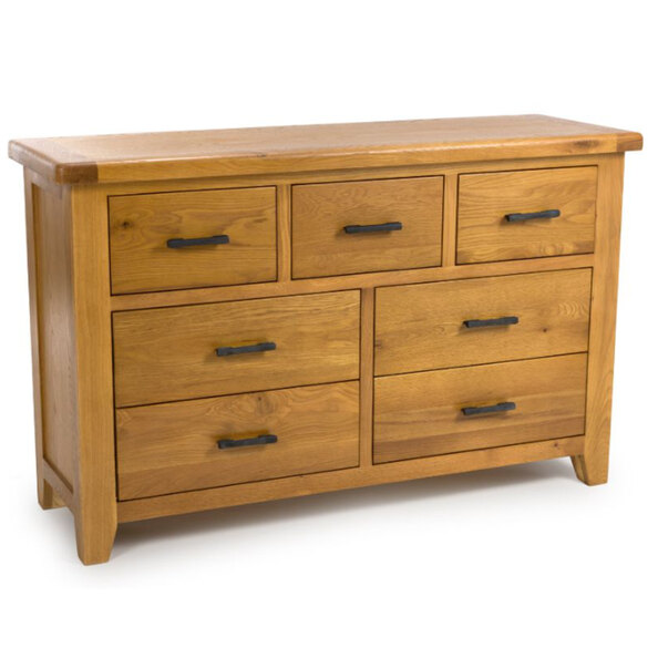 Hewitt Wide Wooden Chest Of 7 Drawers In Rustic Oak
