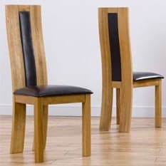 Find the perfect wooden dining chairs to complement your dining table at Furniture in Fashion. Quality and style guaranteed.