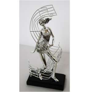 Female Dancer With Musical Note Sculpture
