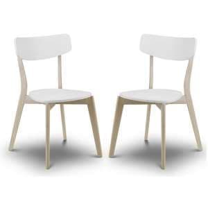 Calah Dining Chairs In White With Oak Effect Legs In A Pair