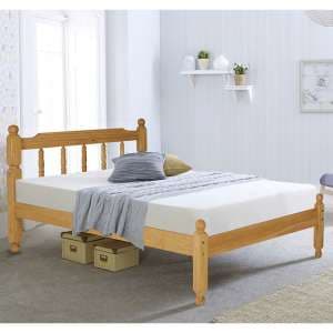 Coleton Spindle Wooden King Size Bed In Waxed Pine - UK