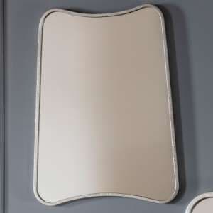 Koran Small Curved Bedroom Mirror In Silver Frame