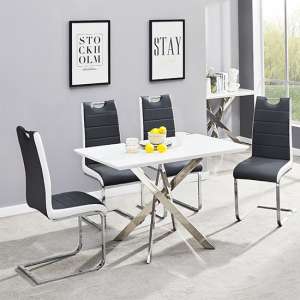 Petra Small White Glass Dining Table 4 Petra Black White Chairs