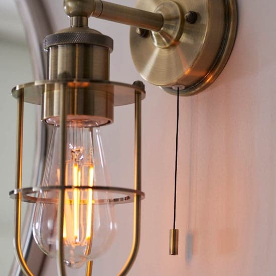 Adrian Industrial Caged Wall Light In Antique Brass_5