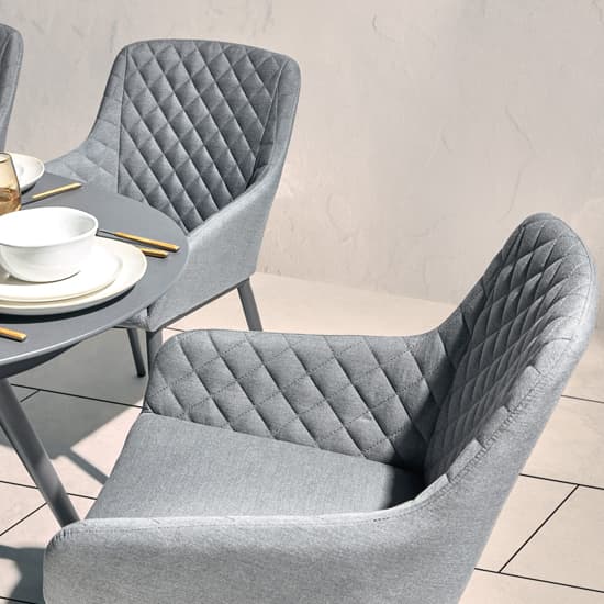 Arica Outdoor Oval Wooden Dining Table With 8 Grey Armchairs_3