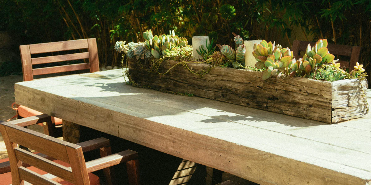 Creating the Ultimate Outdoor Dining Area: Dining Tables and Pizza Ovens