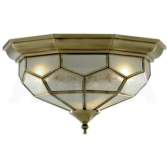 Photo of Antique brass flush light with clear frosted and sanded glass