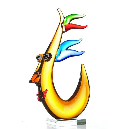 Photo of Slender sculpture in multicoloured glass on clear glass base