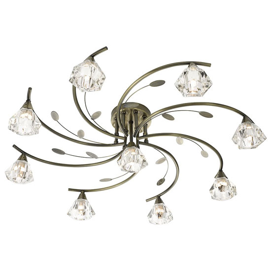 Product photograph of Sierra 9 Antique Brass Ceiling Light With Sculptured Clear Glass from Furniture in Fashion