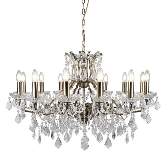 Photo of Antique brass chandelier in clear crystal drops and trim