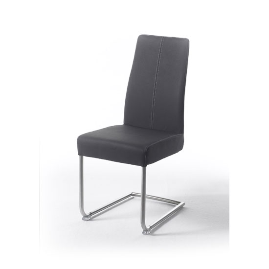 Product photograph of Antigua Metal Swinging Grey Faux Leather Dining Chair from Furniture in Fashion