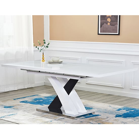 Photo of Axara large extending gloss dining table in white and black