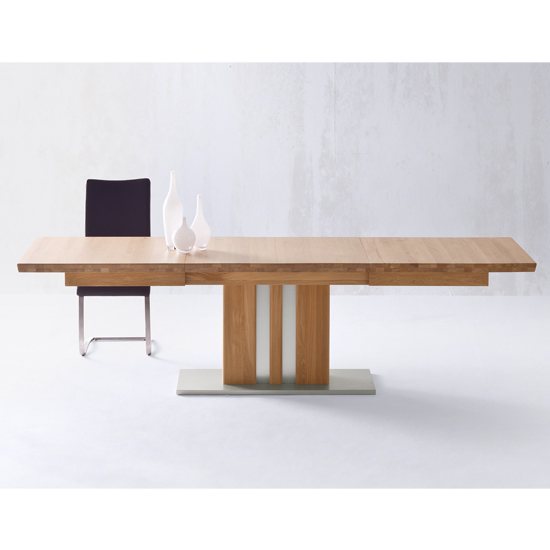 Product photograph of Bolzano Extendable Dining Table In Solid Oak With Steel Base from Furniture in Fashion