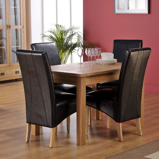 Corrick Dining Table With 4 Black Faux Leather Dining