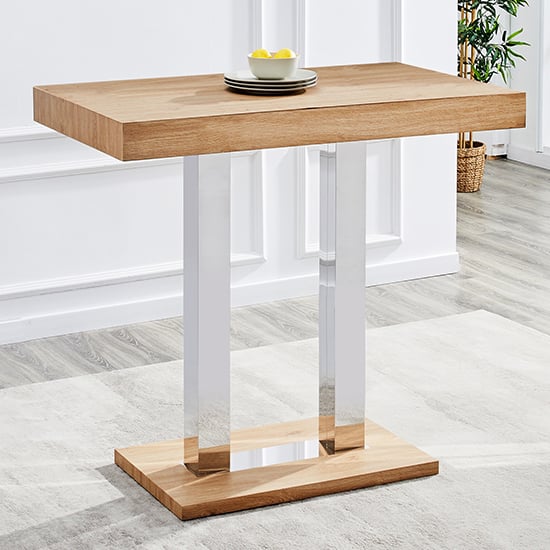 Photo of Caprice rectangular wooden bar table in oak effect