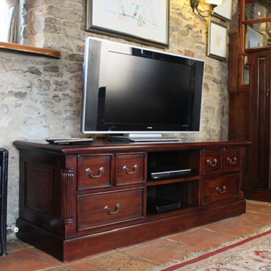 View Belarus widescreen tv stand in mahogany with drawers and shelves