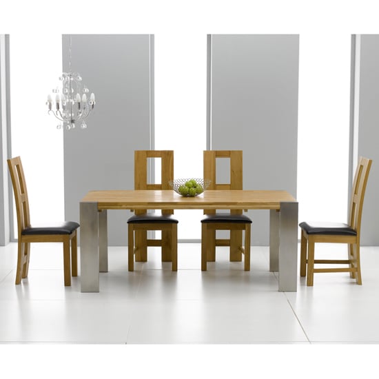 View Louis extending solid oak dining table and 8 louis chairs