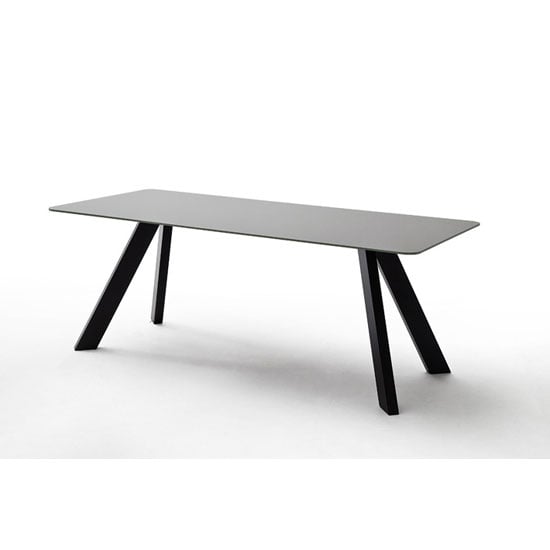 Read more about Nebi glass dining table in grey with metal legs