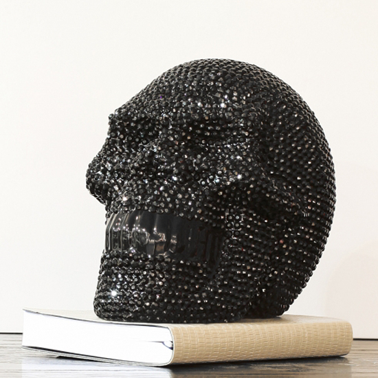 Photo of Large ornament studded black skull