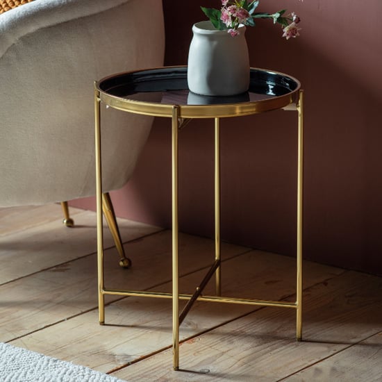 Photo of Abbeville round metal side table in black and gold