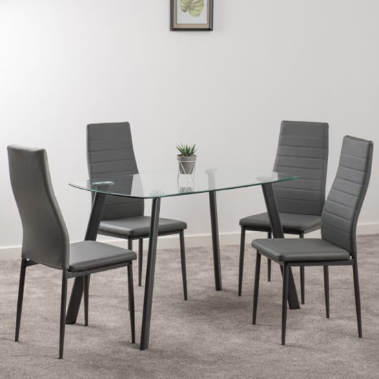 Photo of Aadi clear glass dining table with 4 grey leather chairs