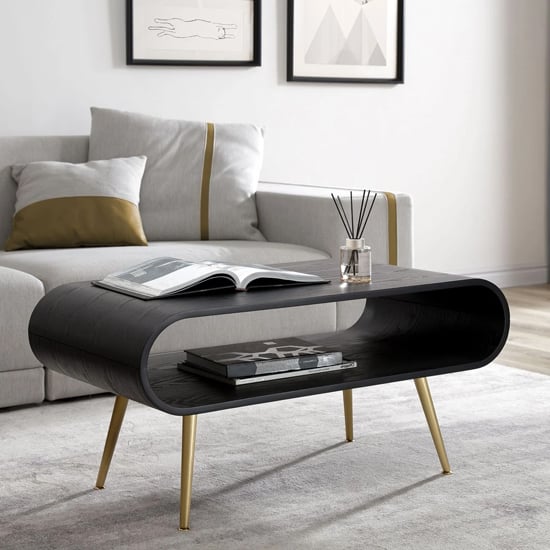 Read more about Abeni wooden coffee in black with brass legs