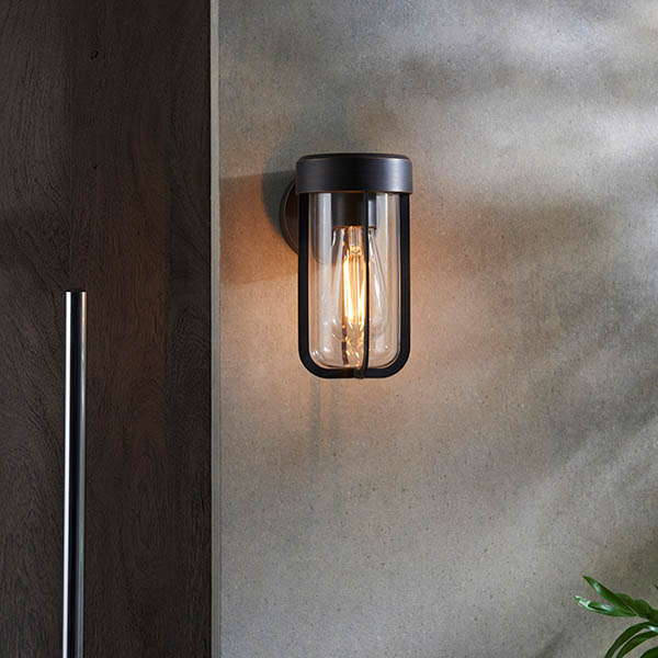 Read more about Adel clear glass shade outdoor wall light in bronze
