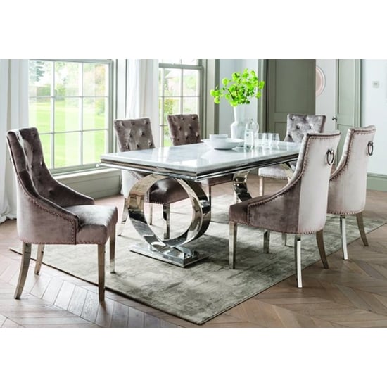 Photo of Adele marble dining table with 8 enmore champagne chairs