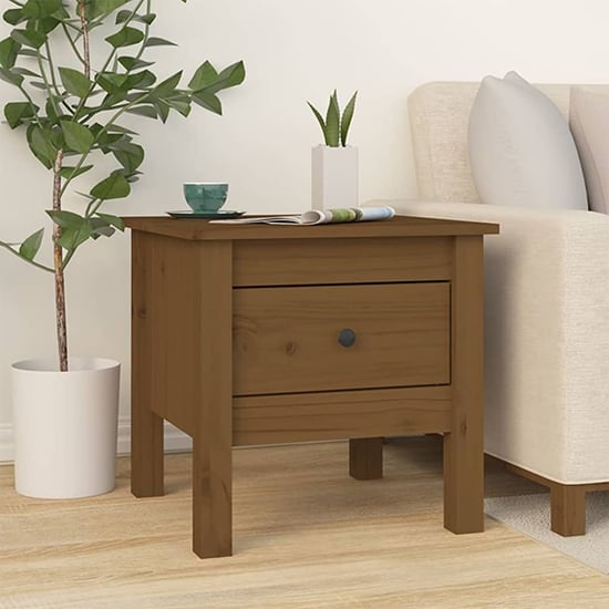 Photo of Aeneas solid pinewood side table with 1 drawer in honey brown