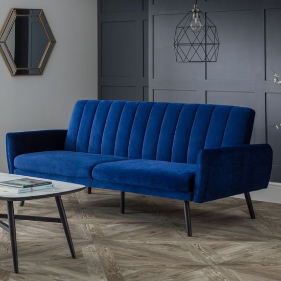 Read more about Abeje velvet sofa bed in blue with black tapered legs