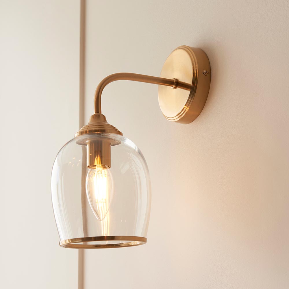 Aiken Clear Glass Wall Light In Brushed Aged Brass