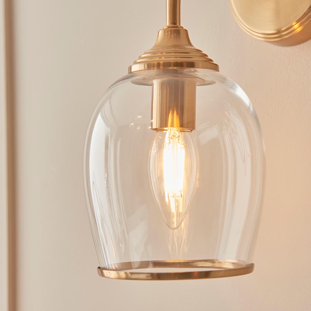 Aiken Clear Glass Wall Light In Brushed Aged Brass