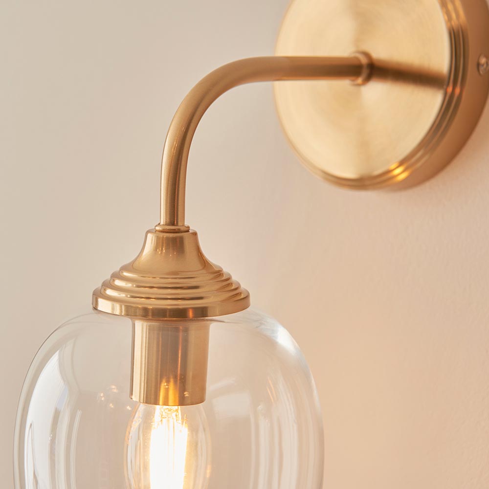 Aiken Clear Glass Wall Light In Brushed Aged Brass