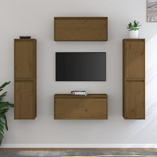 Read more about Akos wall hung solid pinewood entertainment unit in honey brown