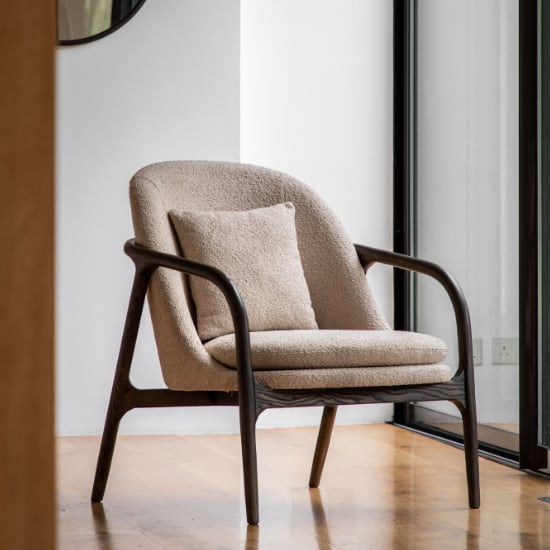 Photo of Allegra fabric armchair with dark wooden frame in taupe