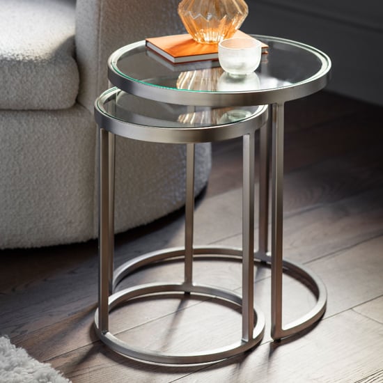 Read more about Alcoa clear glass top nest of 2 tables with silver metal frame