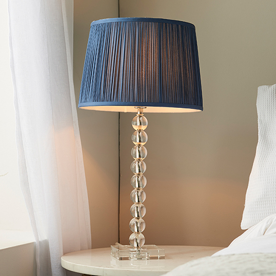 Photo of Alcoy blue silk shade table lamp with clear crystal glass base