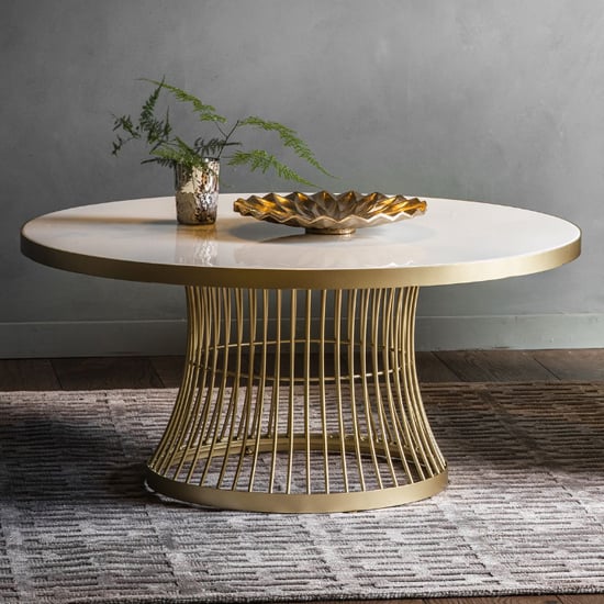 Read more about Alexxis round glass top coffee table in champagne