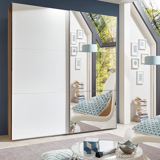 Read more about Alkesia mirrored sliding door wardrobe in white and planked oak