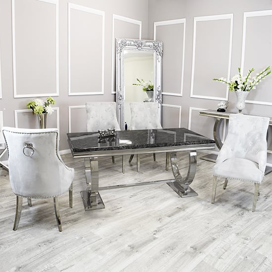 Photo of Alto black marble dining table with 8 dessel light grey chairs