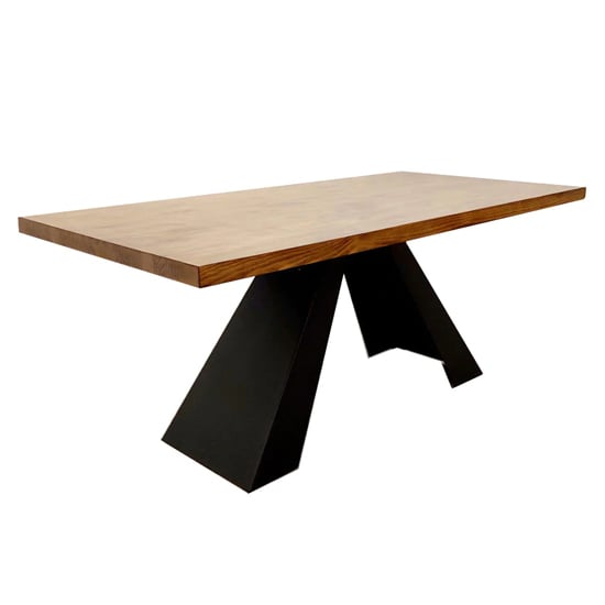 Photo of Alto solid wood dining table in oak with matt black metal base