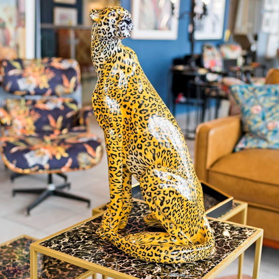 Product photograph of Alton Resin Cheetah Sculpture In Orange from Furniture in Fashion