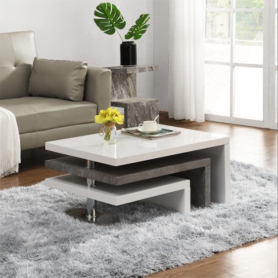 Product photograph of Amani White High Gloss Rotating Coffee Table In Concrete Effect from Furniture in Fashion