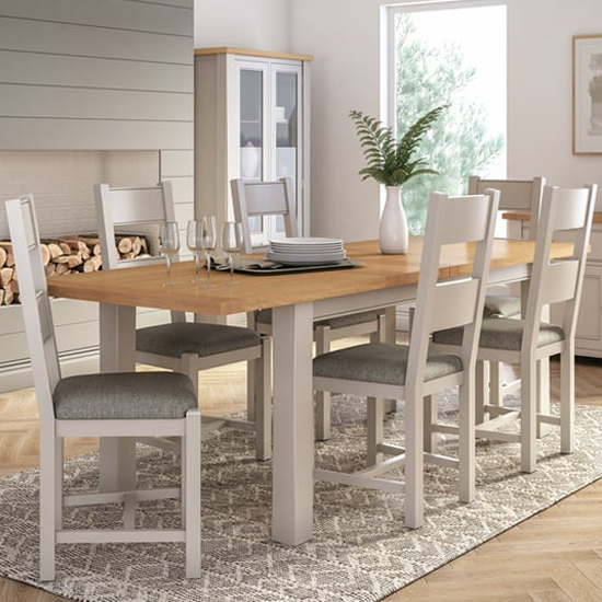 Solid oak extending dining table and store 6 chairs