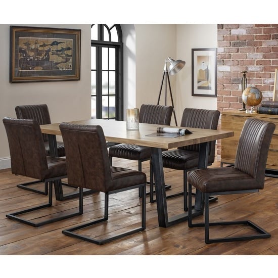 View Amilia wooden dining table in solid oak with 6 brown chairs