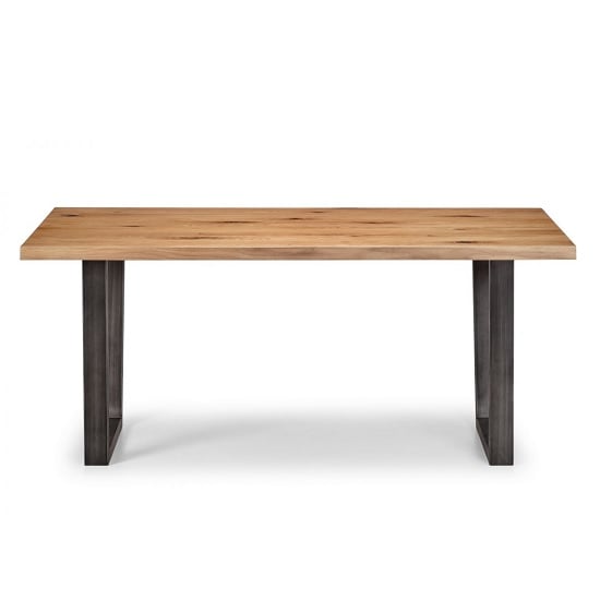 Photo of Barras wooden dining table in solid oak and metal legs