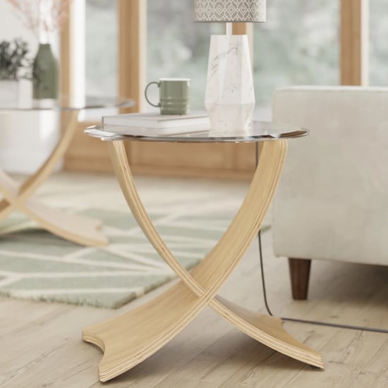Read more about Anfossi round clear glass lamp table with oak legs