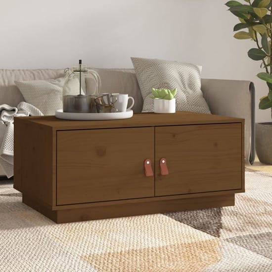 Product photograph of Anicet Pinewood Coffee Table With 2 Doors In Honey Brown from Furniture in Fashion